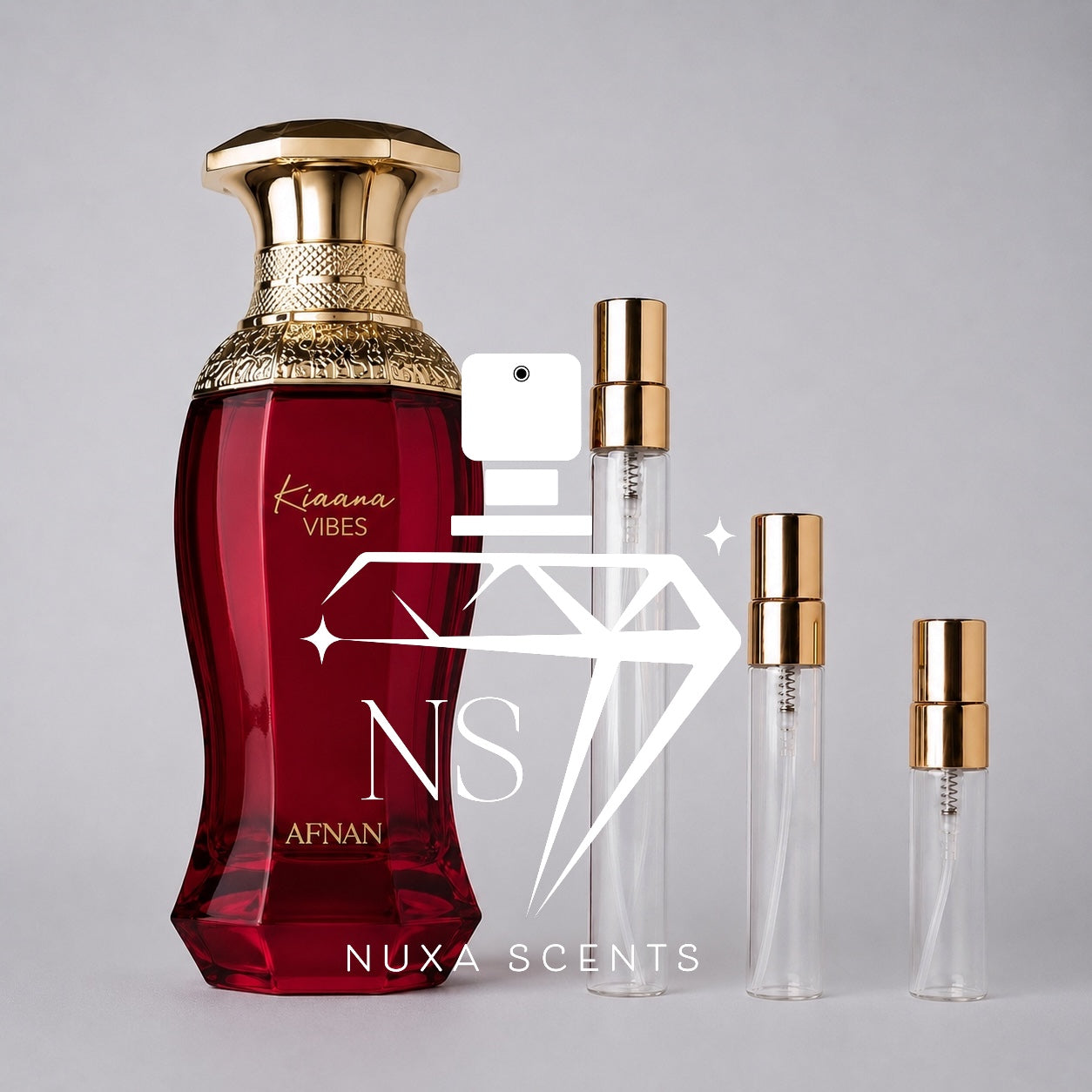 Red perfume bottle with gold cap and smaller clear bottles on a gray background