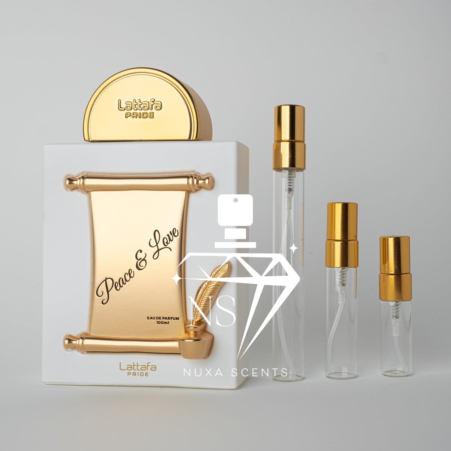 Lattafa Prive perfume set with gold and white design on a light gray background