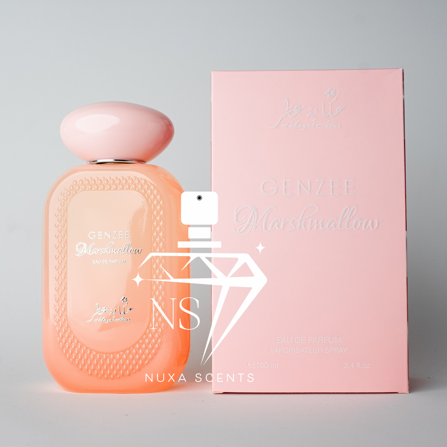A perfume bottle and box set of Genzee Marshmallow EDP by Hekayat Attar, with the product name and brand prominently displayed on the packaging.