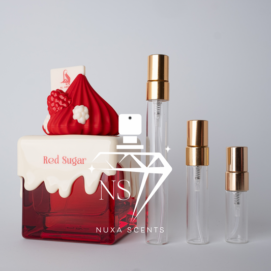 Red Sugar perfume bottle with gold caps and Nuxa Scents logo on a gray background