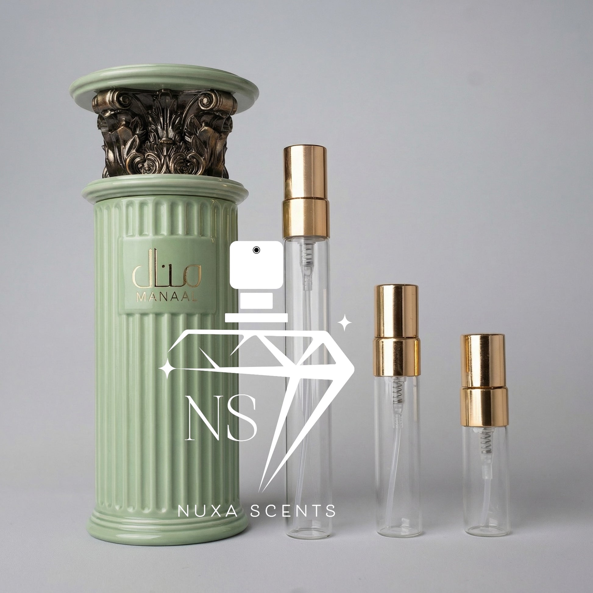 Nuxe Scents perfume bottles on a gray background