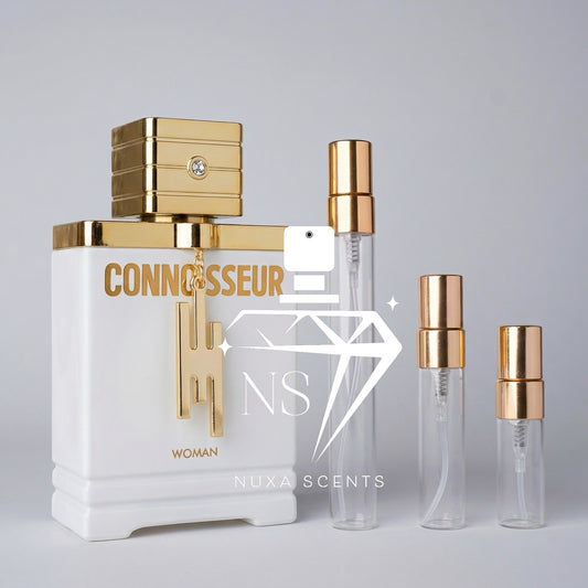 Perfume bottle labeled 'Connoisseur' by Nuxa Scents on a gray background