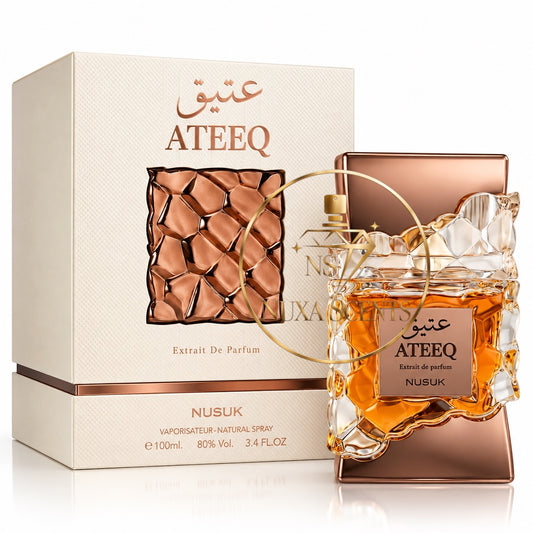 Nusuk Ateeq Extrait De Parfum perfume bottle with a rose gold metallic frame and amber liquid, shown next to its cream-colored packaging box with rose gold lettering.
