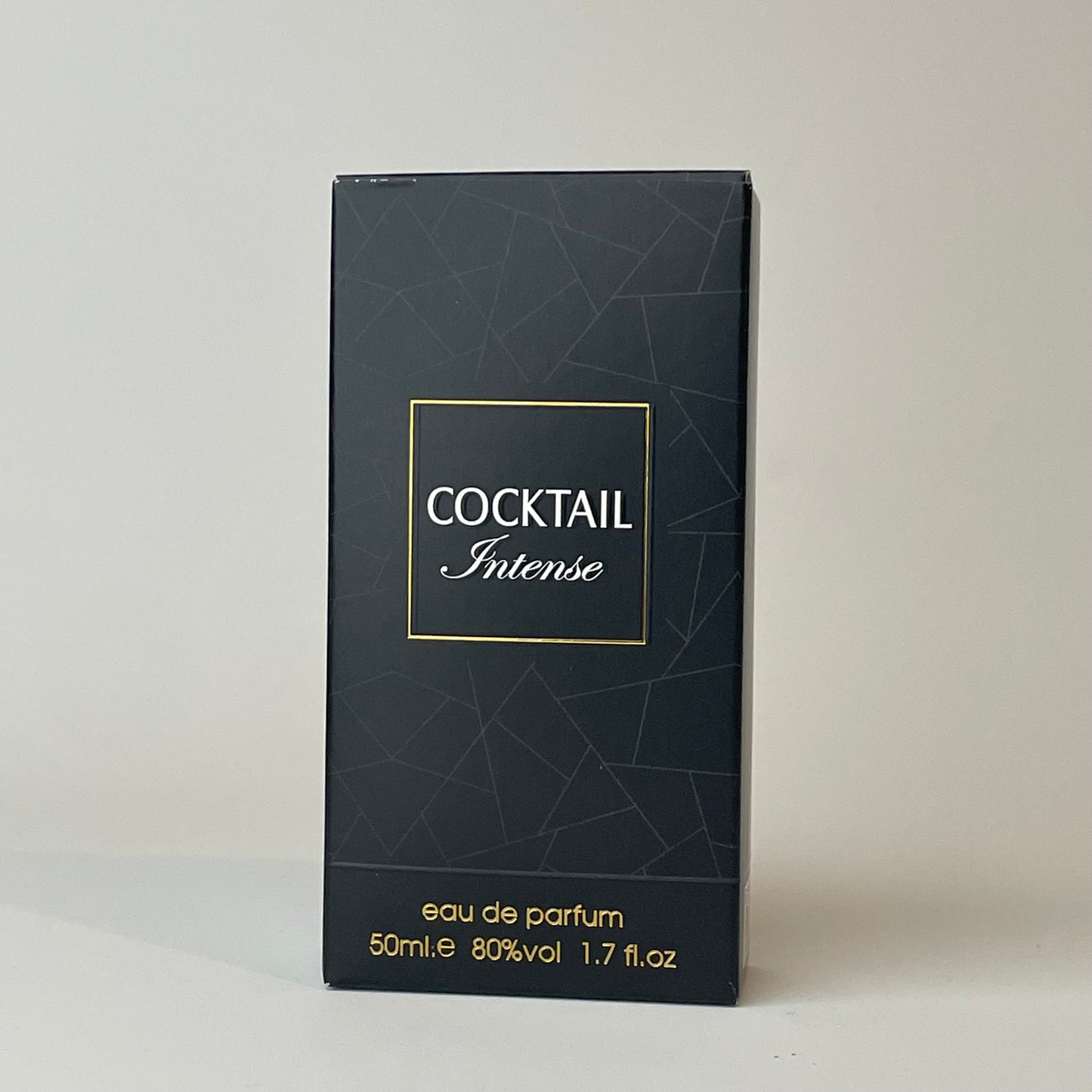 Black perfume box with 'Cocktail Intense' text on a white background