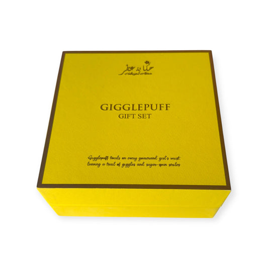 Yellow gift box with 'Gigglepuff' branding on a white background
