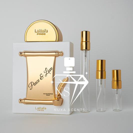 Lattafa Prive perfume set with gold and white design on a light gray background