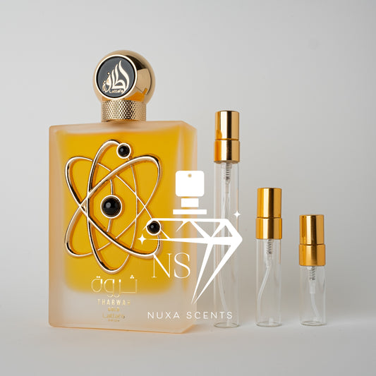 Perfume bottle with gold cap  on a light gray background
