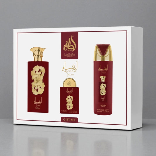Gift set packaging with red and gold bottles on a white background