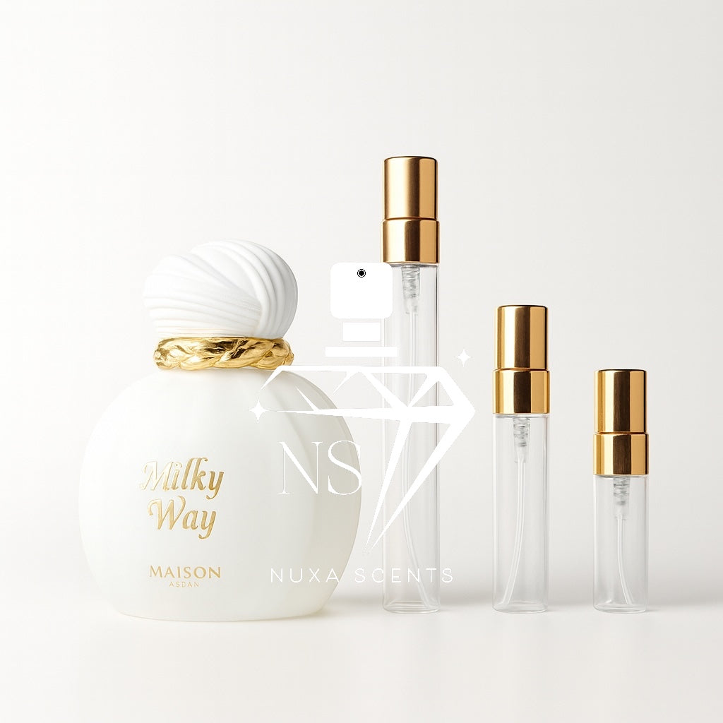 Set of perfume bottles with gold caps on a white background