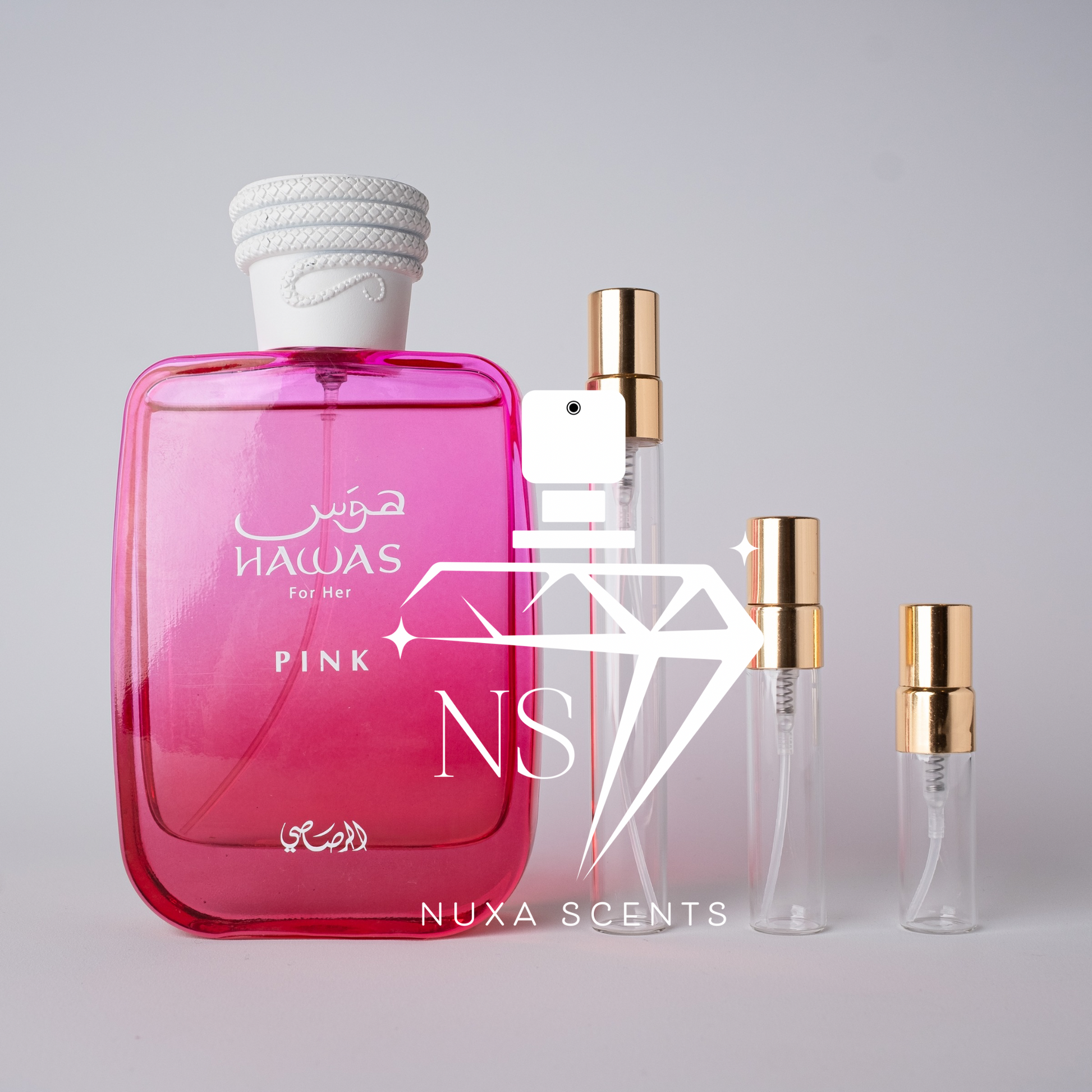 Pink perfume bottle with white cap and gold caps on a gray background, featuring rasasi branding.