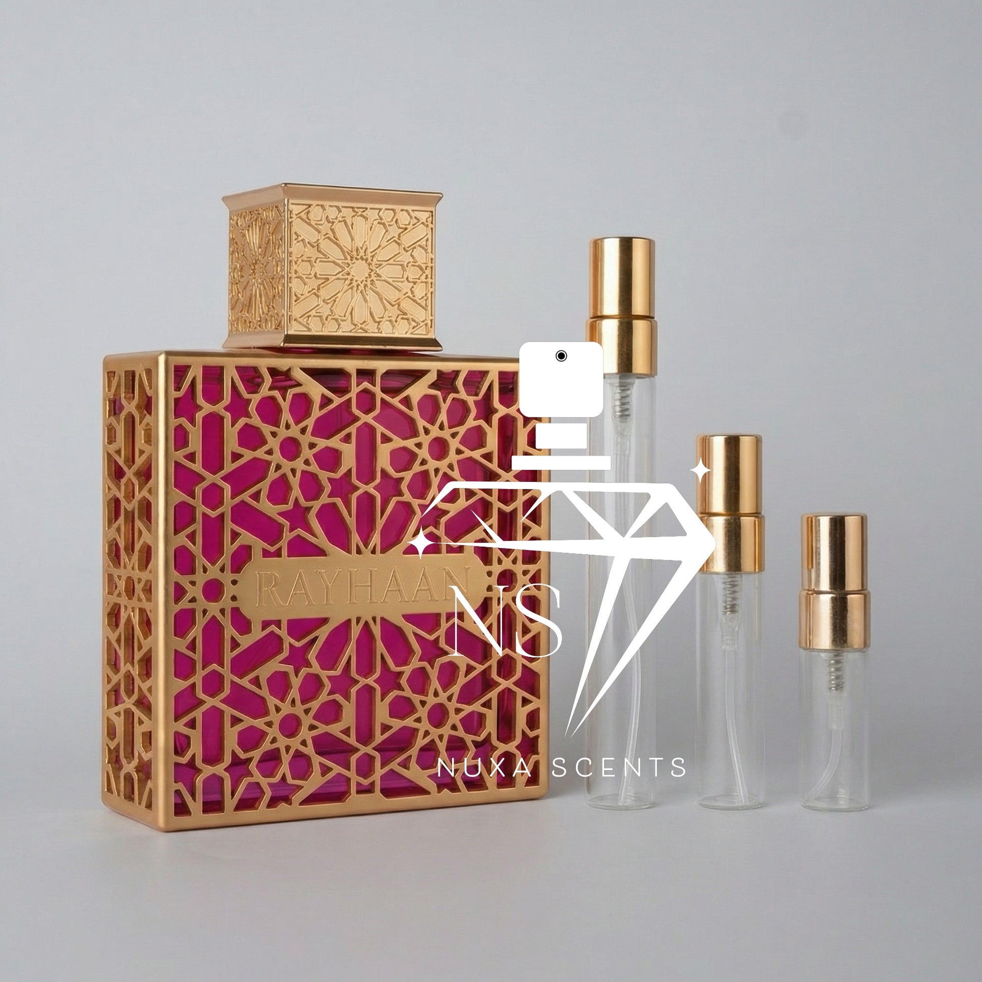 Perfume bottle with gold and pink design on a gray background