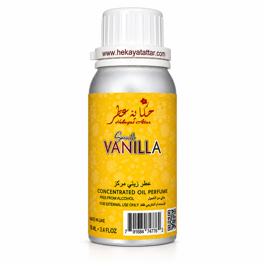 A 30 mL bottle of Holy Angel Vanilla concentrated oil perfume, featuring a yellow label with floral patterns, a silver metallic bottle body, and a white ribbed cap.