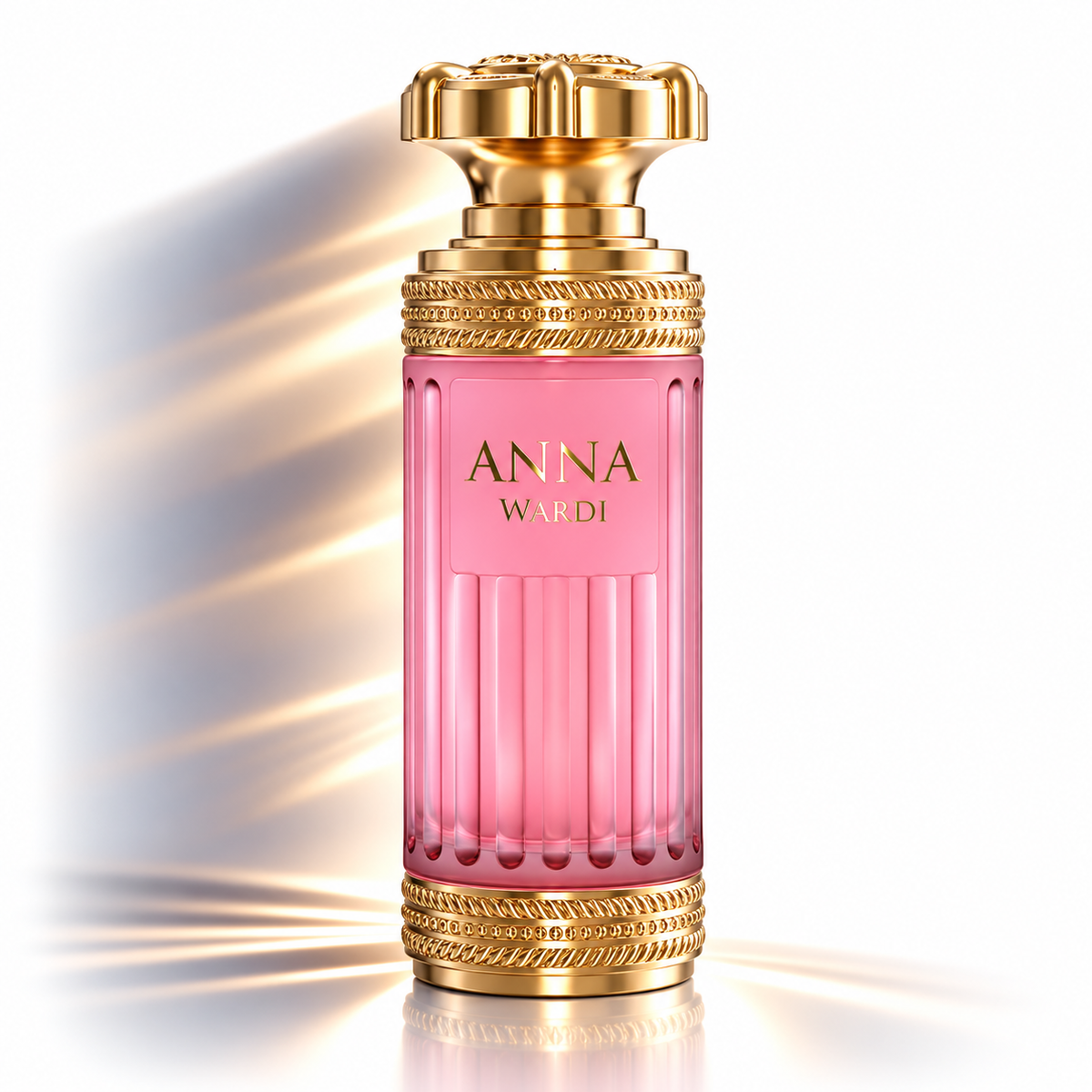 Anna Wardi perfume bottle in pink glass with ornate gold metal detailing and cap, centered on a white background with soft light rays.