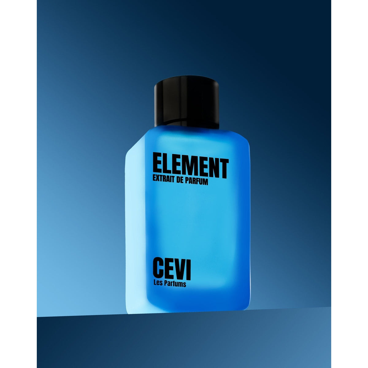 Close-up of the blue Element by Cevi Les Parfums 100ml extrait de parfum bottle against a dark blue background