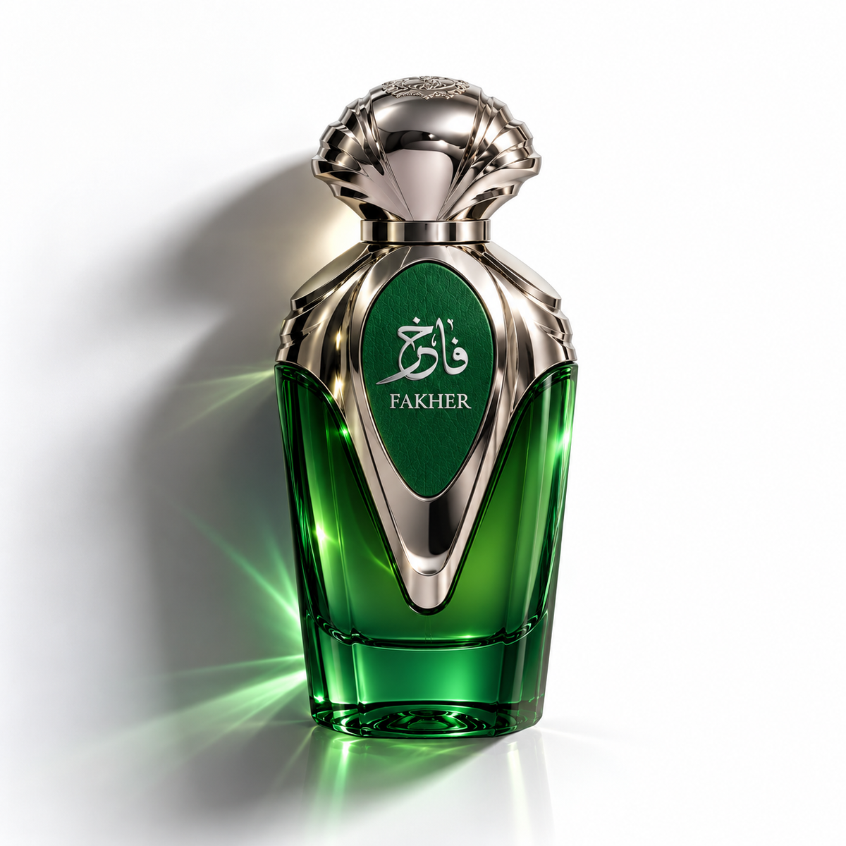 A green glass perfume bottle with a metallic silver cap and a green label featuring the brand name 'FAKHER' in white, set against a clean white background with a soft shadow.
