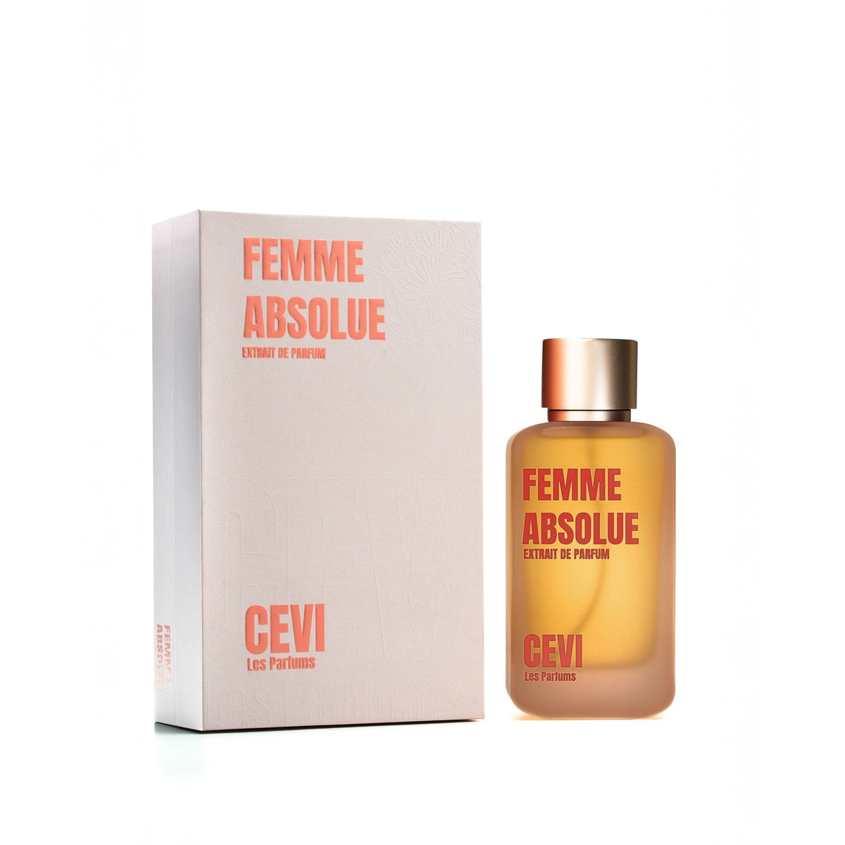 Femme Absolue by Cevi Les Parfums peach perfume bottle with brushed gold cap beside its white box | Nuxa Scents