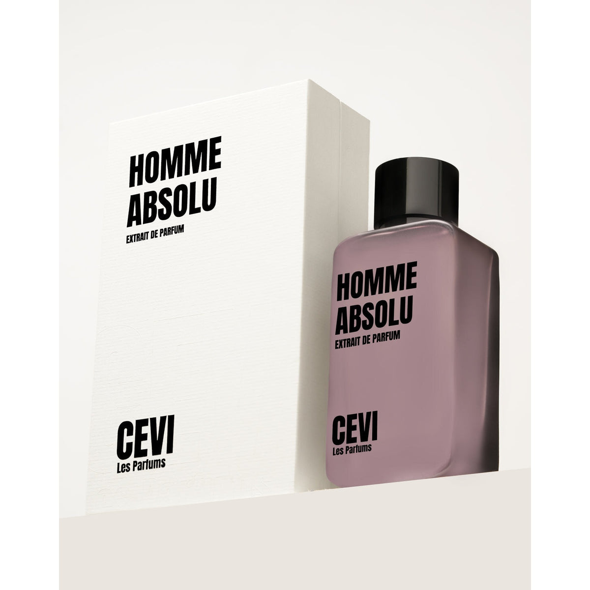 Homme Absolu by Cevi Les Parfums mauve perfume bottle in front of its white box