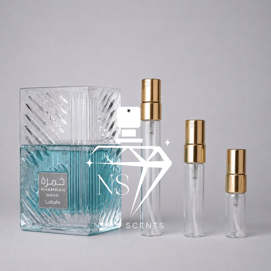 Perfume bottle with gold caps and 'NS' branding on a gray background