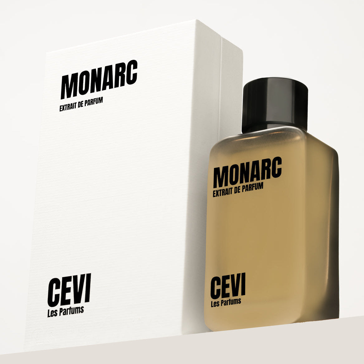 Monarc 100ml Extrait de Parfum bottle in front of its white box | Nuxa Scents