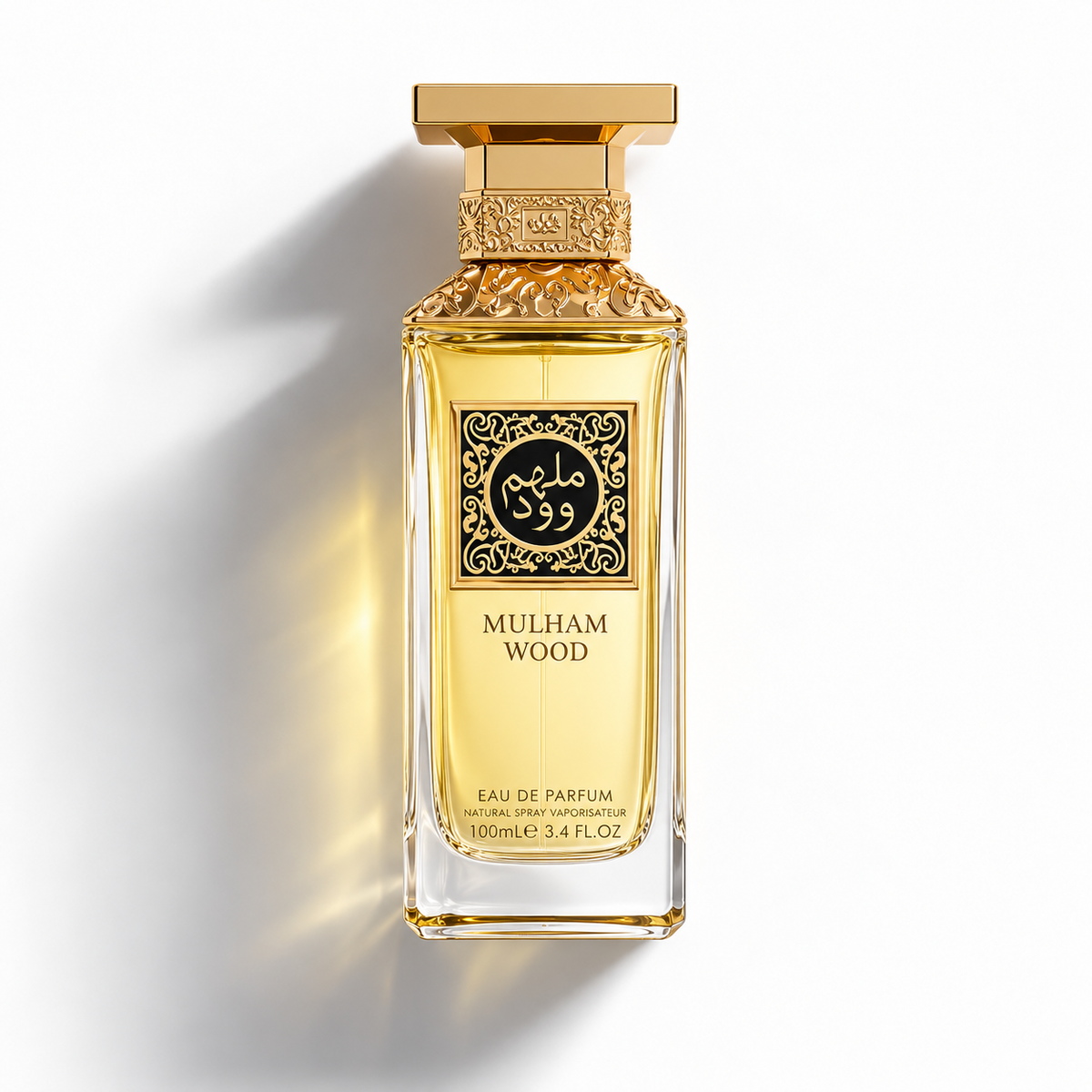 A bottle of Mulham Wood Eau de Parfum by Alro S99, featuring a clear glass bottle filled with golden-yellow liquid, a black and gold label, and an ornate gold cap, set against a clean white background with a soft shadow.