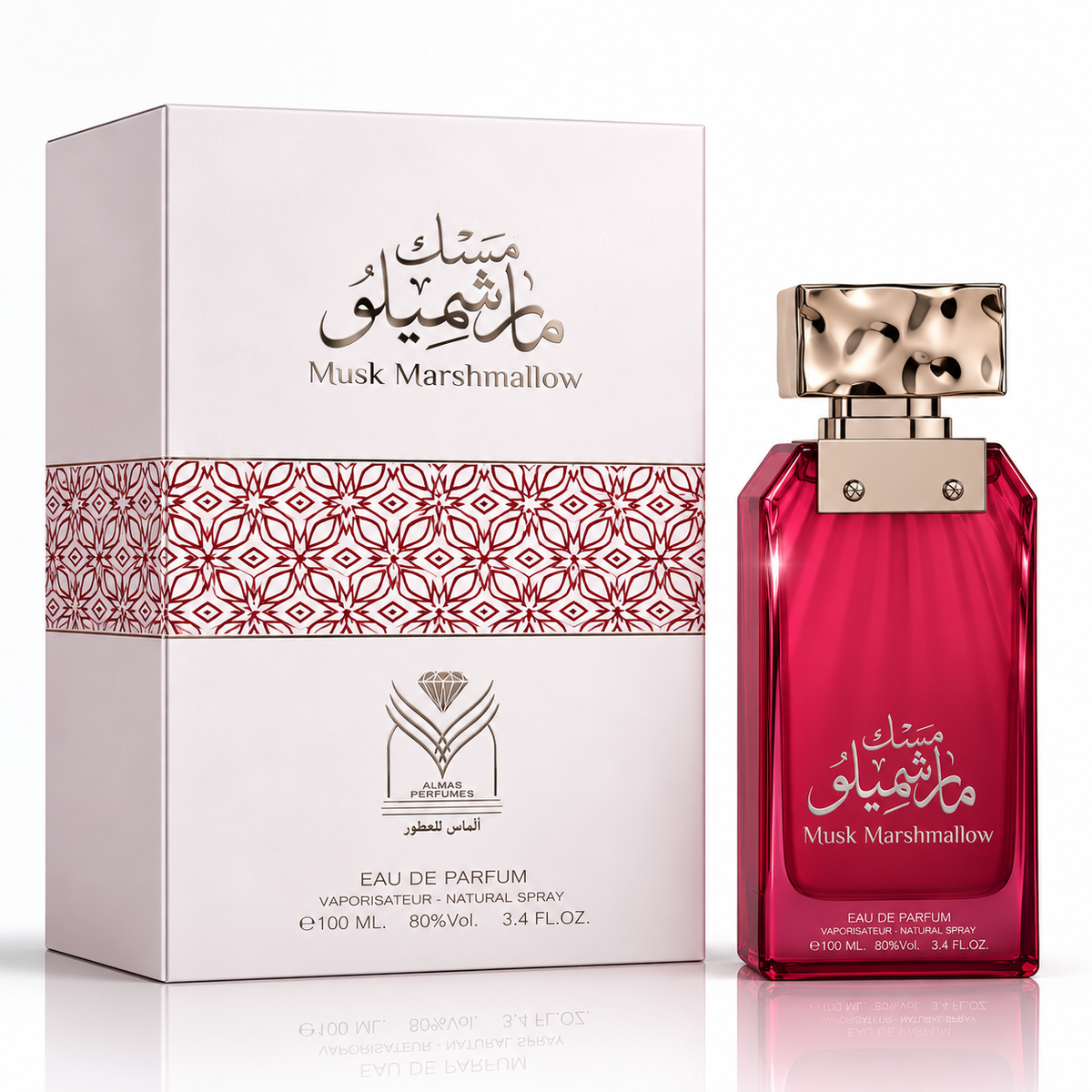 Musk Marshmallow perfume bottle and its packaging box. The bottle is a translucent deep pink-red glass with a metallic gold cap, and the box is white with a red geometric pattern band.