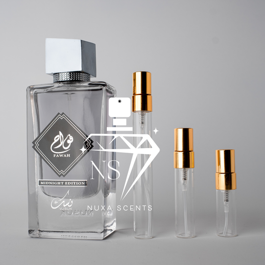 Perfume bottle and travel-sized bottles with 'Nusuk' branding on a gray background