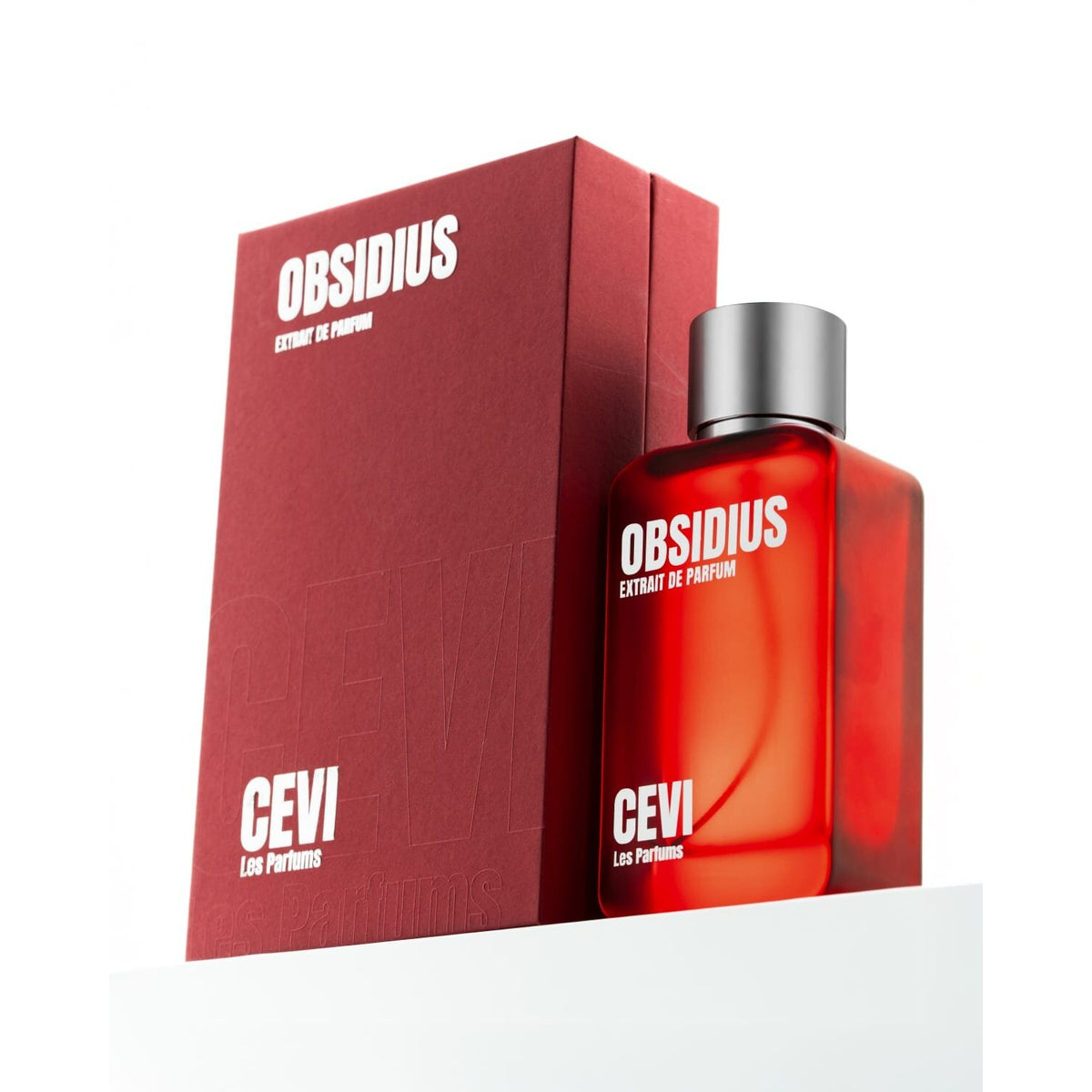 Obsidius by Cevi Les Parfums 100ml extrait de parfum, red bottle with silver cap next to its red box | Nuxa Scents