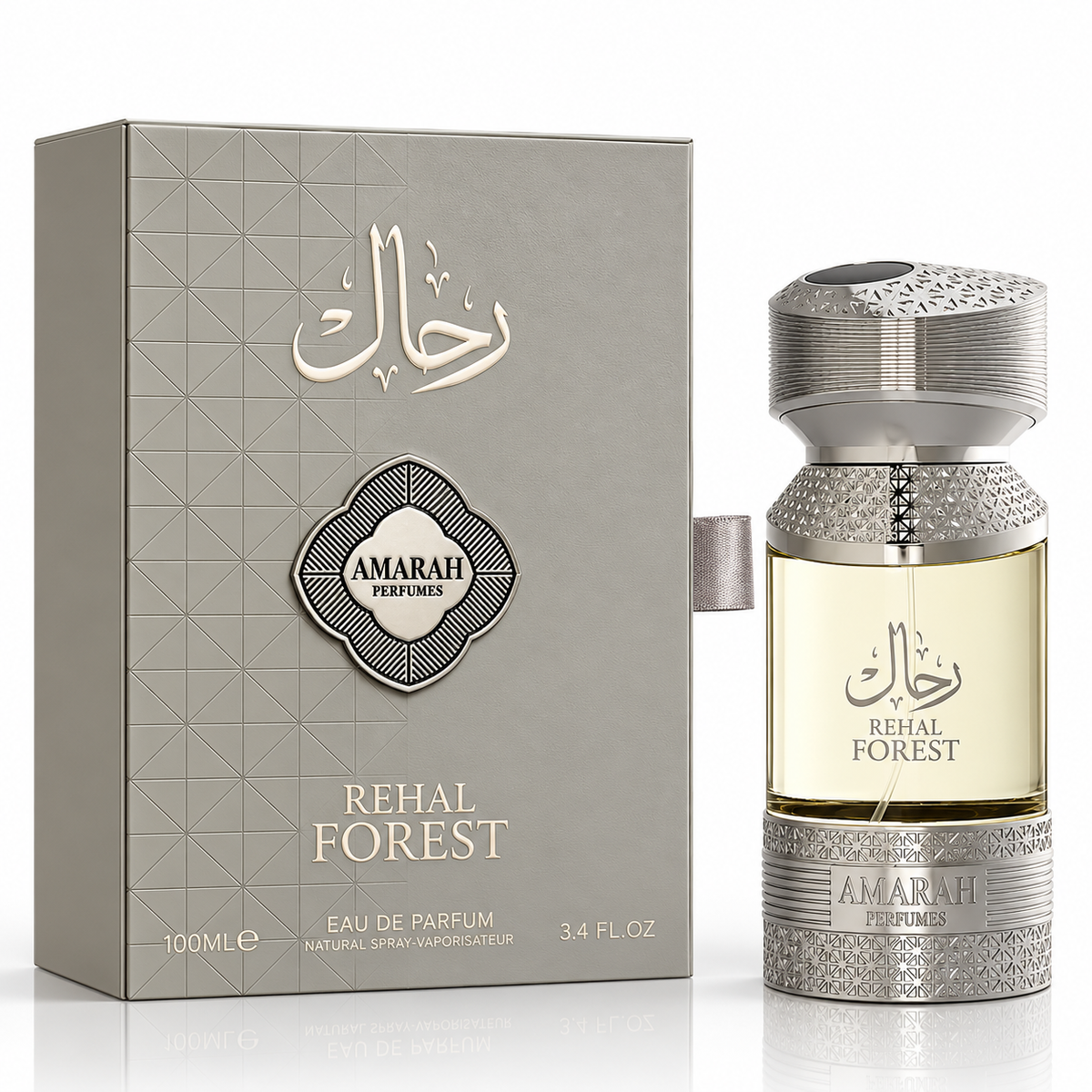 Amarah Perfumes Rehal Forest Eau de Parfum bottle next to its textured gray packaging box, featuring silver Arabic calligraphy and a silver crystal-embellished cap and base.